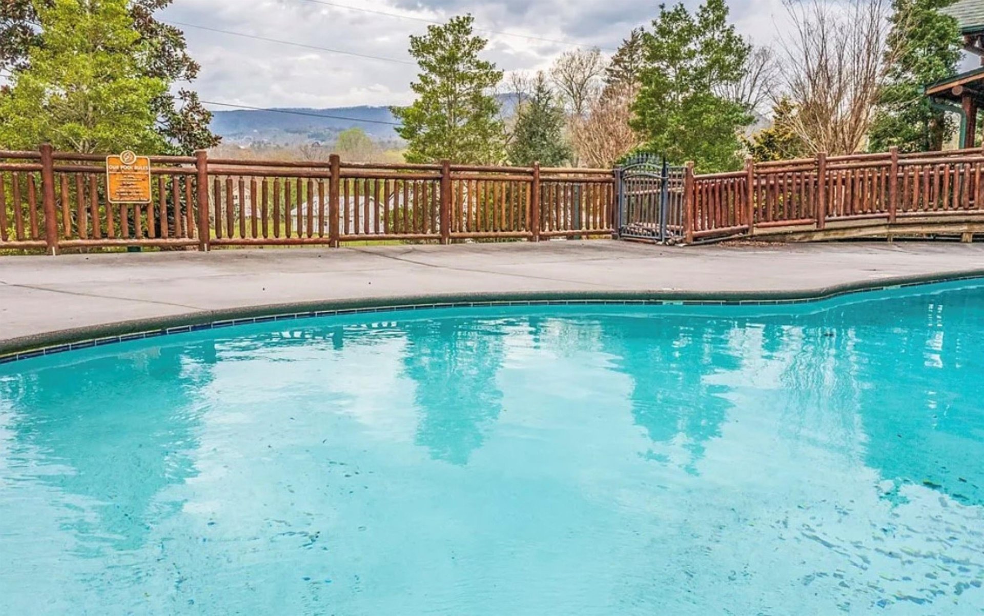 Dive into crystalclear waters while soaking up stunning mountain vistas from your private poolside paradise.