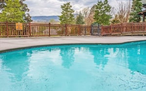 Dive into crystalclear waters while soaking up stunning mountain vistas from your private poolside paradise.