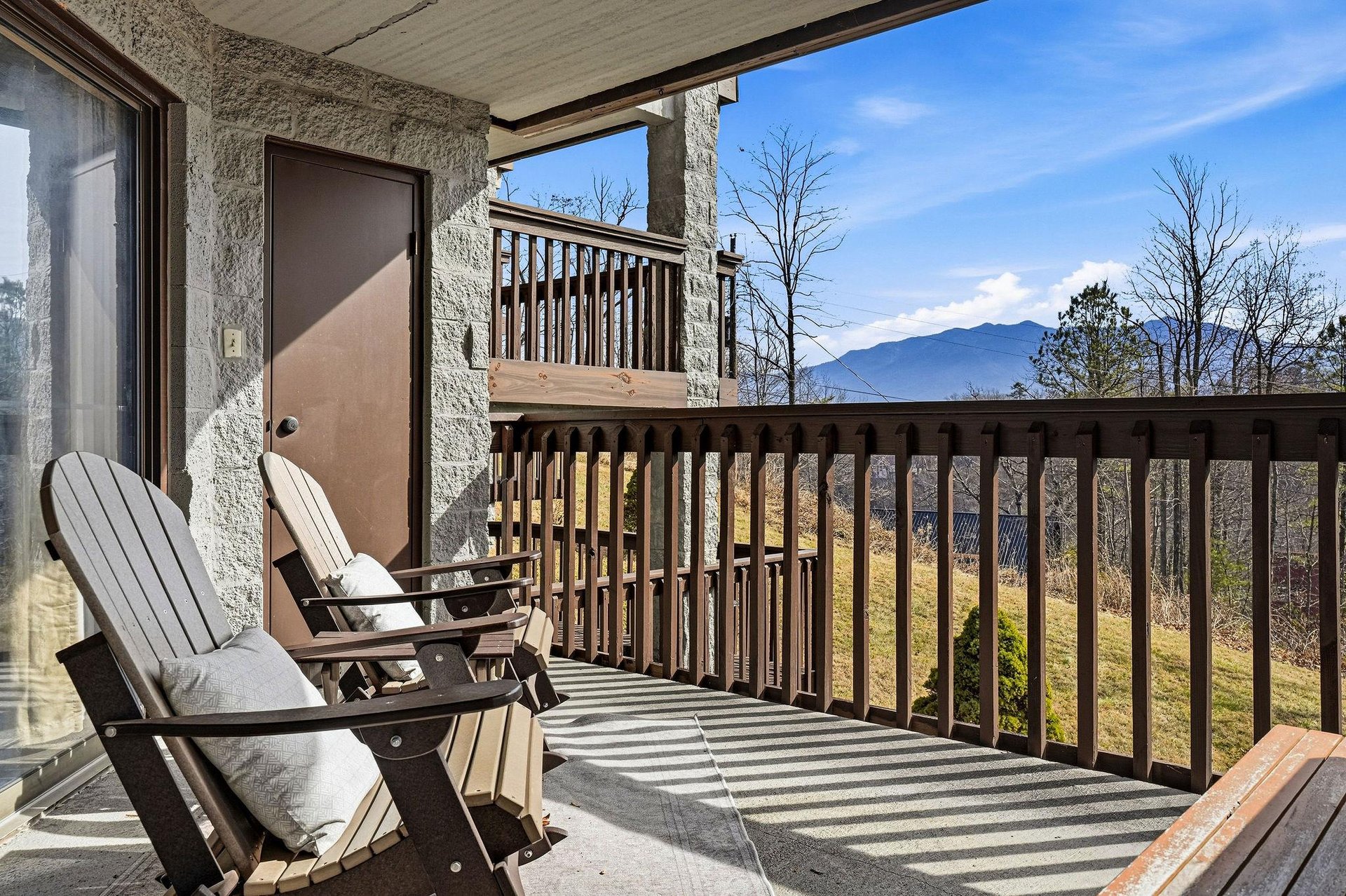 Relax in your private balcony chairs while soaking in breathtaking mountain views that stretch endlessly beyond the peaceful landscape.