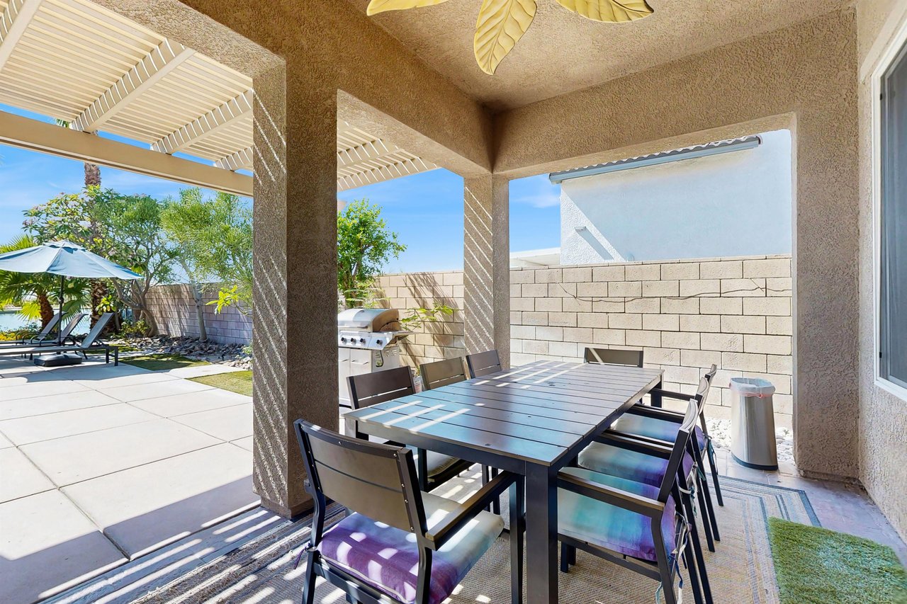 Patio dining for 8 located just off of the living room.