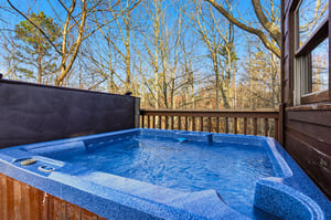 Soak away your stress in your private hot tub, surrounded by peaceful woodland views on your secluded deck.