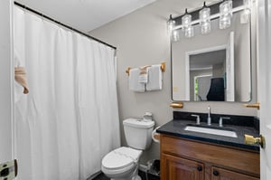 Shower and single vanity sink