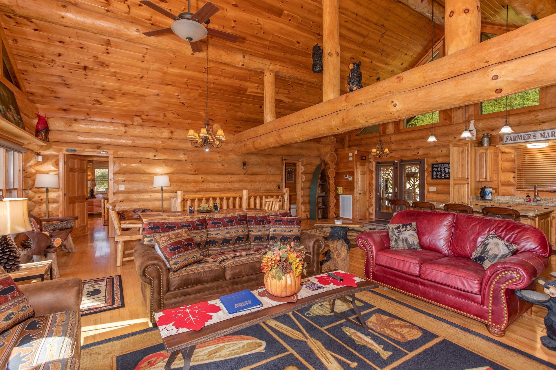 Living room with lots of seating and a sleeper sofa at Great View Lodge, a 5bedroom cabin rental located in Pigeon Forge