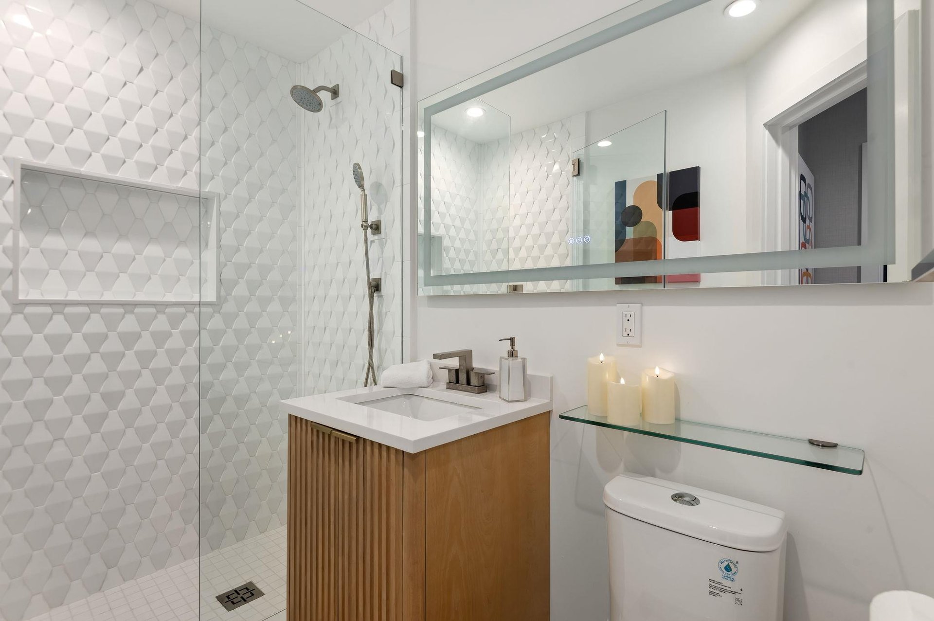 Shared bathroom with walkin shower.