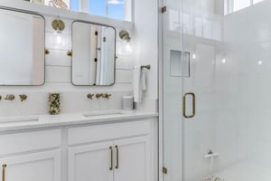 Enclosed rainfall shower in King Suite