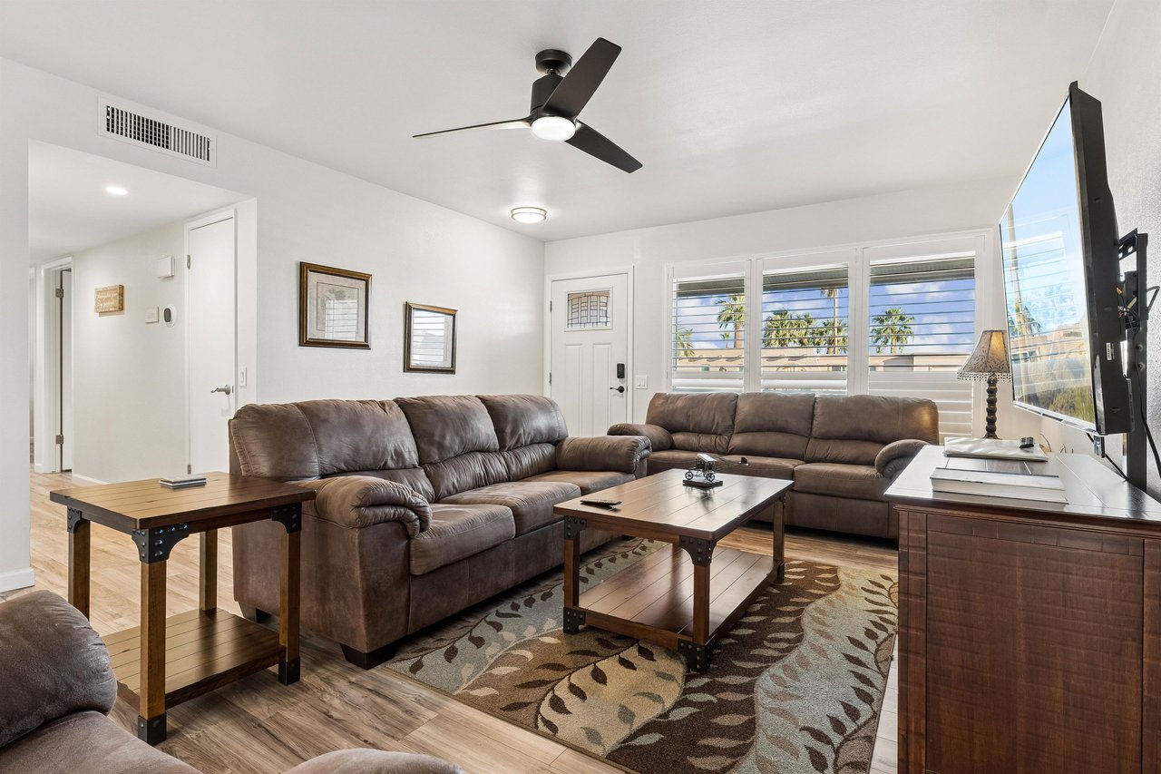 Features a flatscreen TV with streaming, pullout couch for additional sleeping space, and openconcept floor plan.