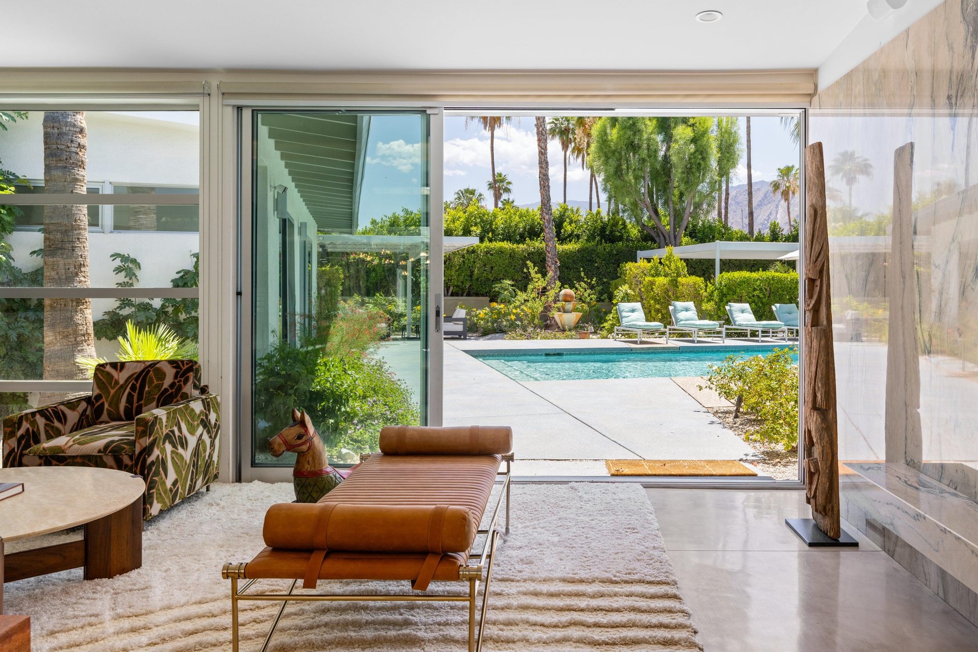 Sliding doors open to bring the outdoors, in.