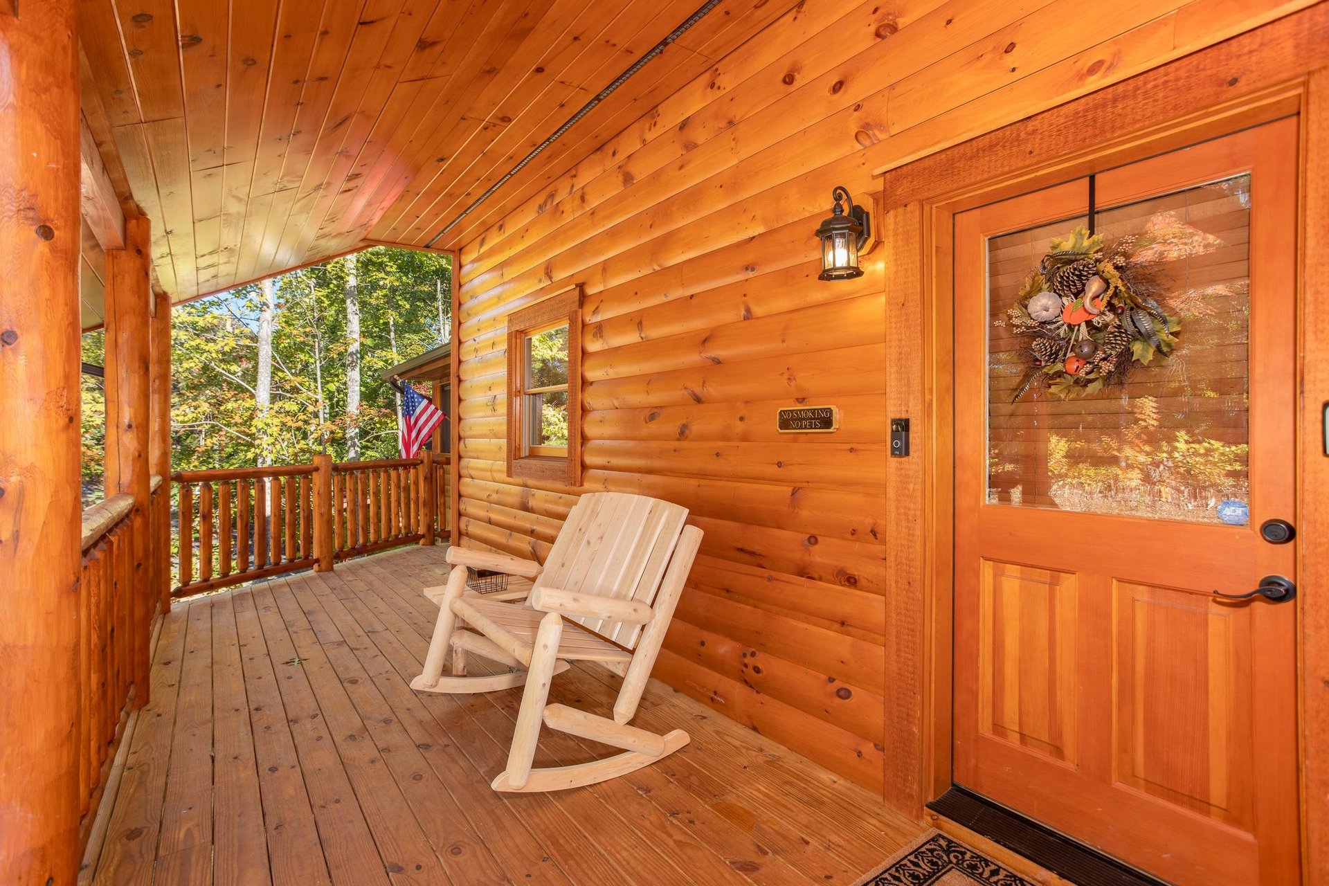 Outdoor rocking bench by front door