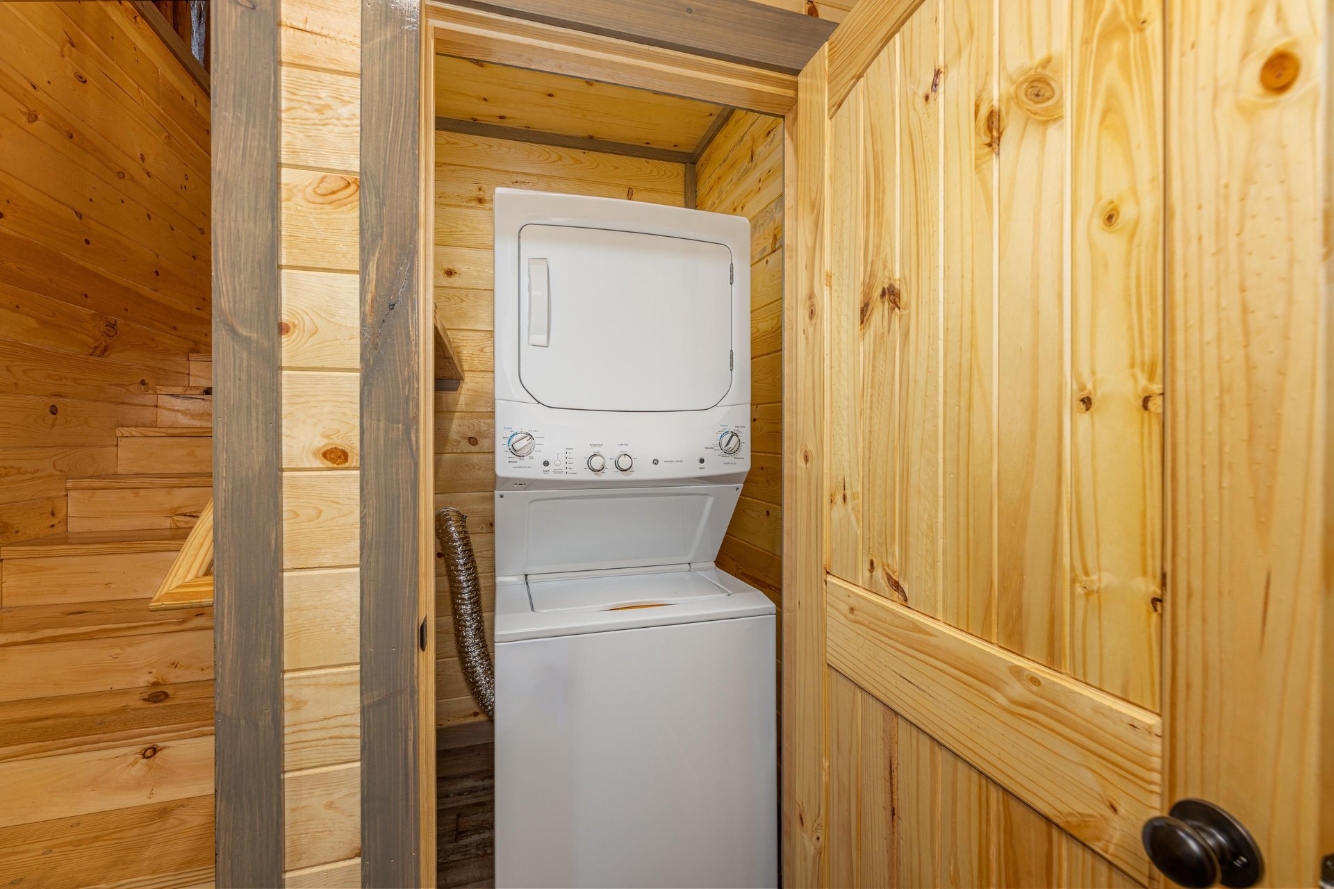 Stacked washer and dryer at Everlys Splash, a 4 bedroom cabin rental located in Pigeon Forge