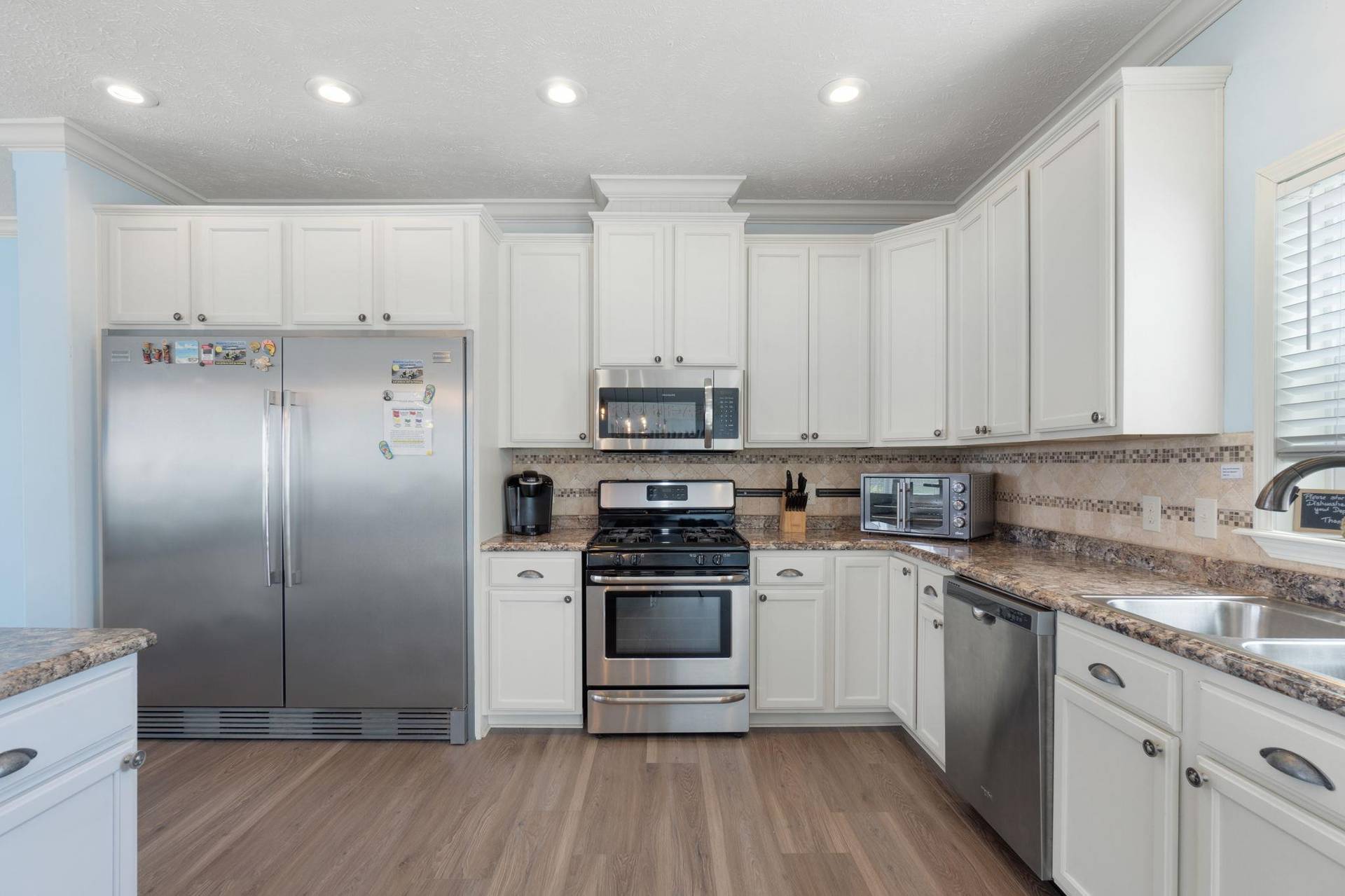 Kitchen With Massive FridgeFreezer