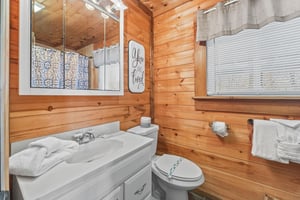 Full bathroom at Living on Love, a 2 bedroom cabin rental located in Pigeon Forge