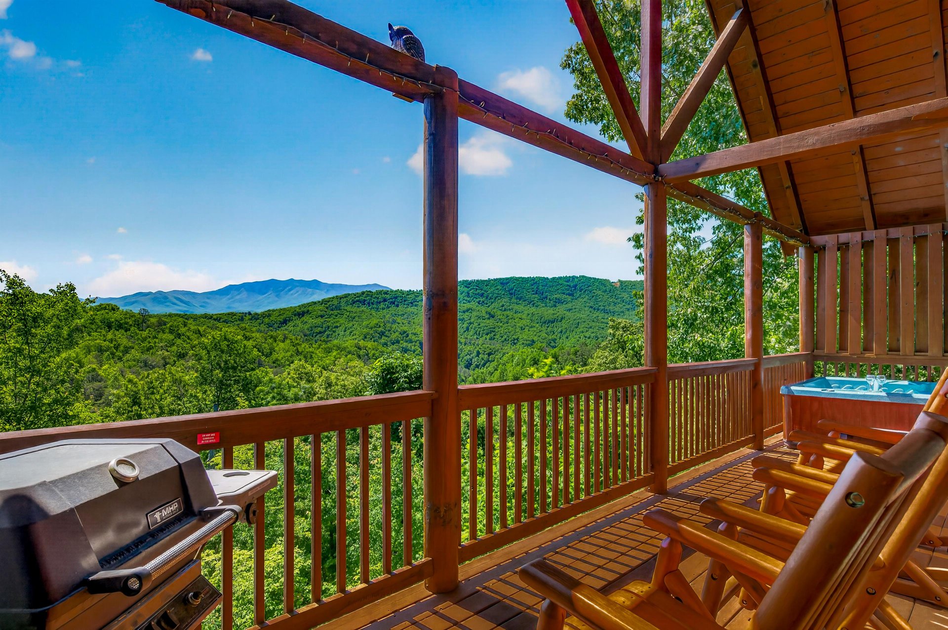 Breathtaking mountain views stretch across the horizon from your private deck, where youll find a hot tub, BBQ grill, and cozy seating for relaxing mornings and evenings.