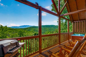 Breathtaking mountain views stretch across the horizon from your private deck, where youll find a hot tub, BBQ grill, and cozy seating for relaxing mornings and evenings.
