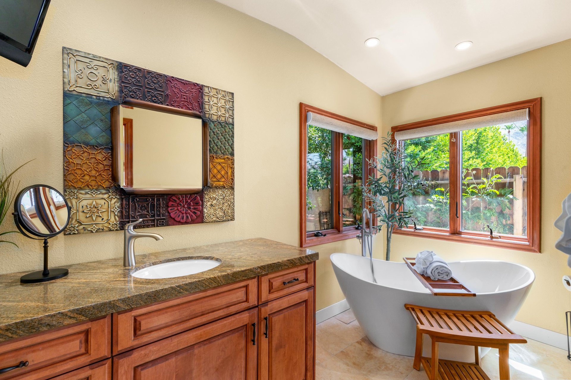 Ensuite bathroom with standalone shower and tub.