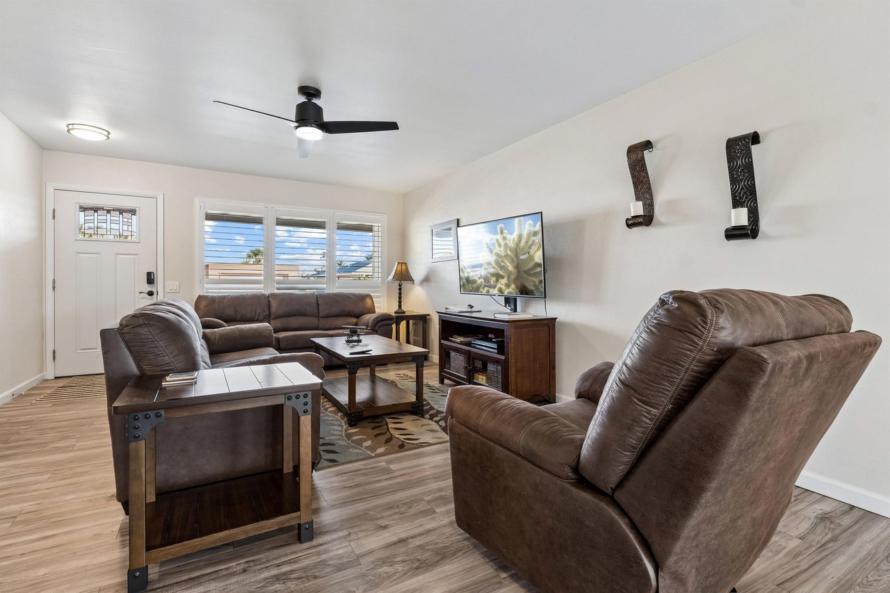Features a flatscreen TV with streaming, pullout couch for additional sleeping space, and openconcept floor plan.
