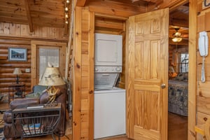 Stacked washer and dryer at A Lovers Secret, a 1 bedroom cabin rental located in Gatlinburg