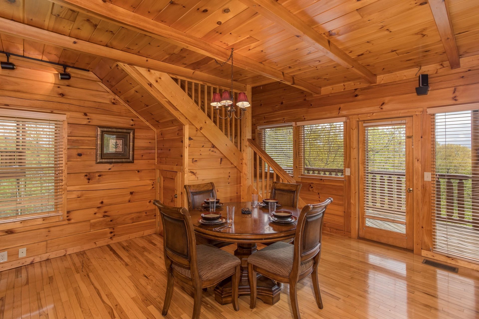 Dining table for four at Howlin in the Smokies, a 2 bedroom cabin rental located in Pigeon Forge