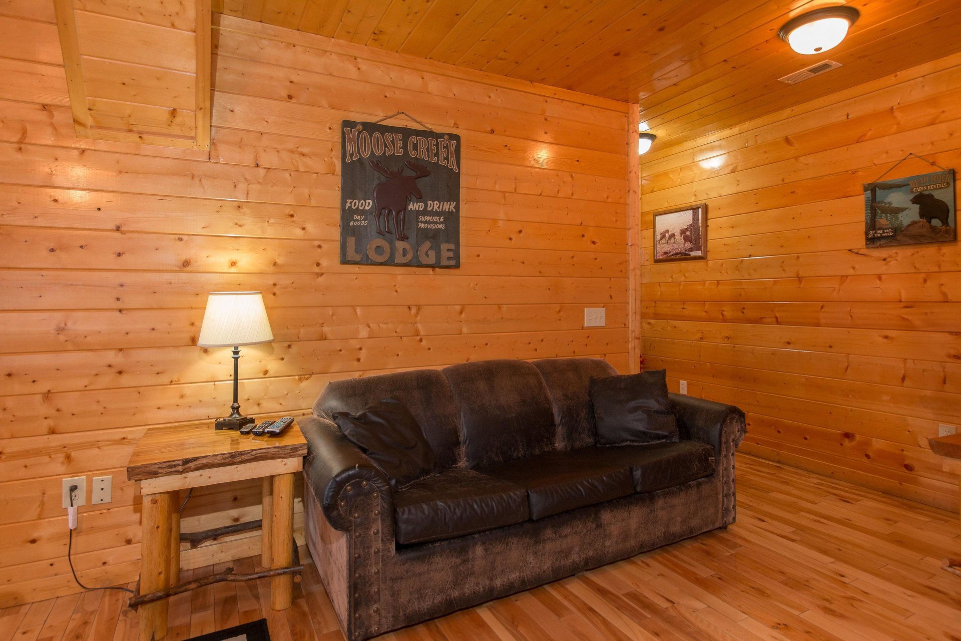 Sofa in the game room at Country Bears Getaway, a 3bedroom cabin rental located in Gatlinburg
