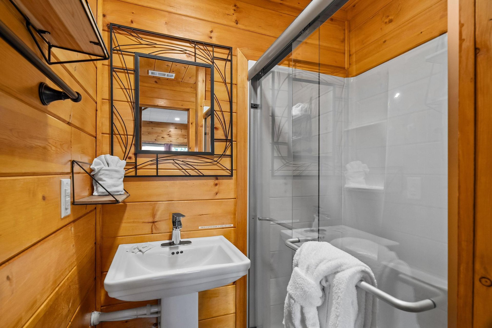 single vanity sink with walk in shower