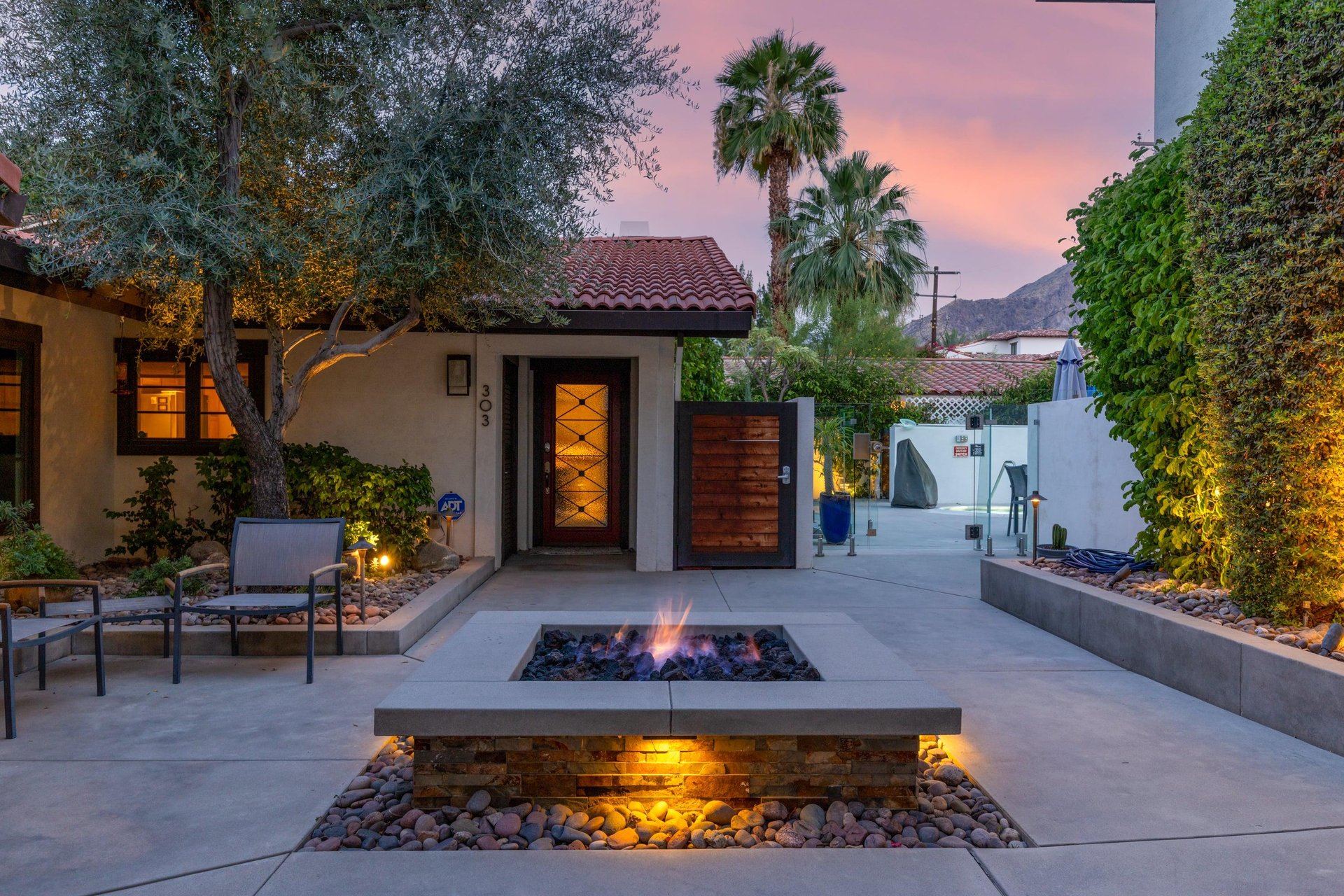 View of the shared courtyard entering into the complex, looking at the entrance to the pool area.