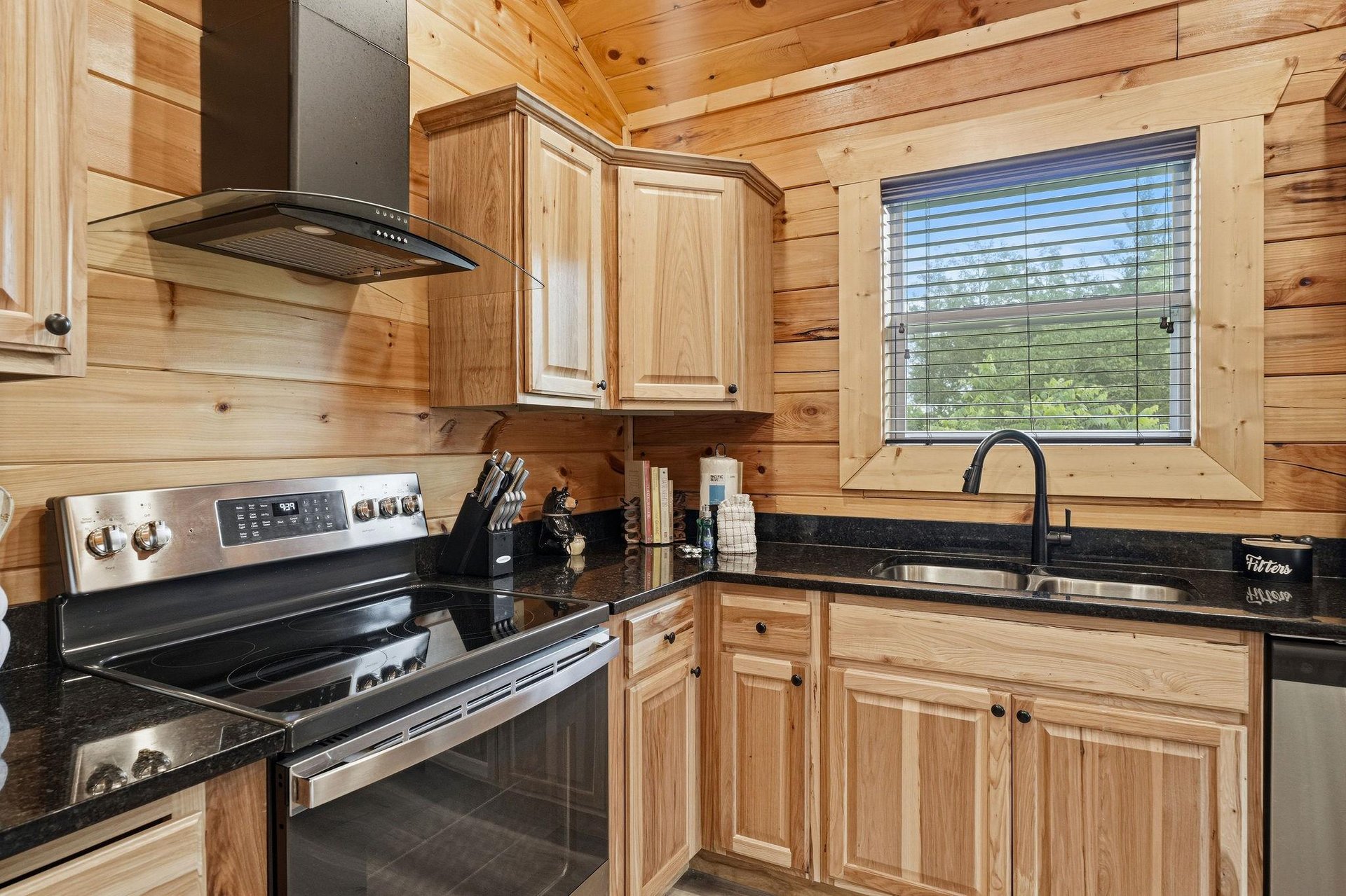 Step into your cozy mountain retreat and discover a fully equipped kitchen where rustic charm meets modern convenience. Warm wood tones and sleek appliances invite you to prepare meals surrounded by n