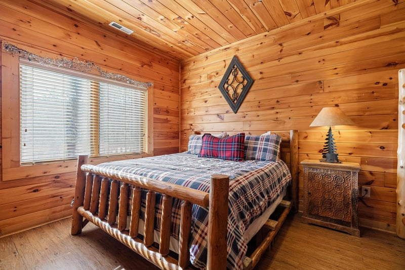 King Bed at Mountain Mama, a 3 bedroom cabin rental located in pigeon forge