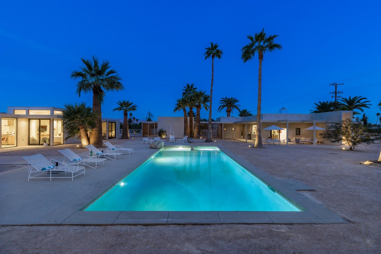 Surrounded by towering palm trees