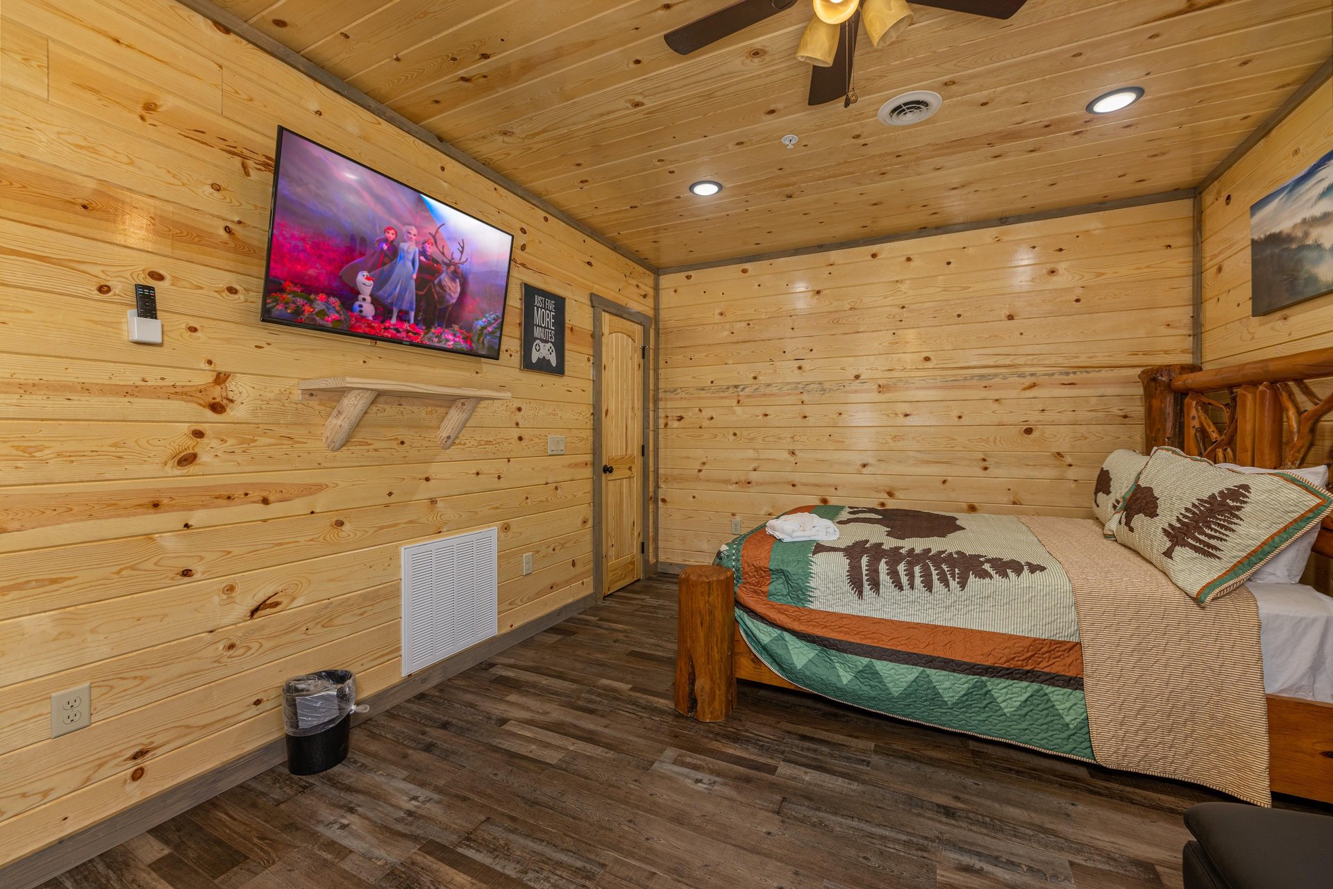 First TV in the double queen bedroom at Everlys Splash, a 4 bedroom cabin rental located in Pigeon Forge