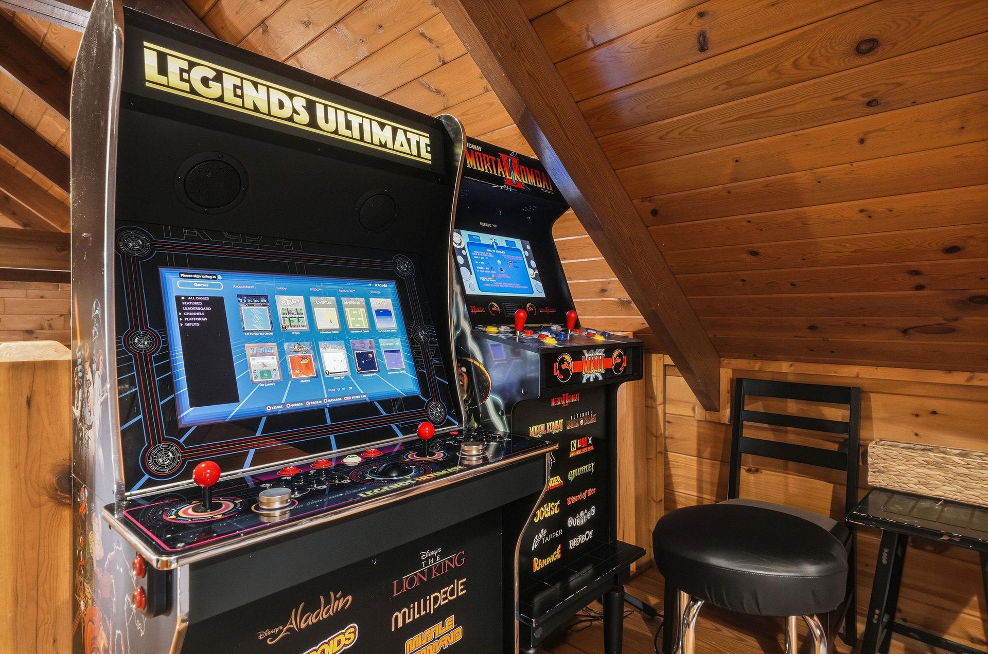 Challenge your travel companions to classic arcade games in this cozy woodpaneled game nook, where nostalgic fun awaits around every corner.