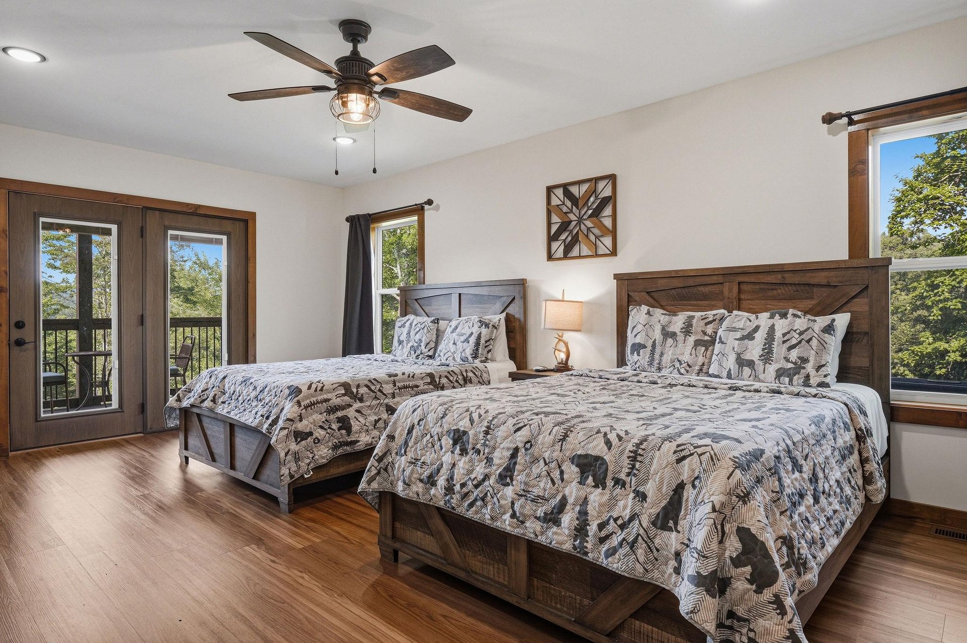 Unwind in your cozy retreat, where rustic wood accents and soft linens create the perfect haven. Natural light pours through the windows, inviting you to relax after a day of adventure.