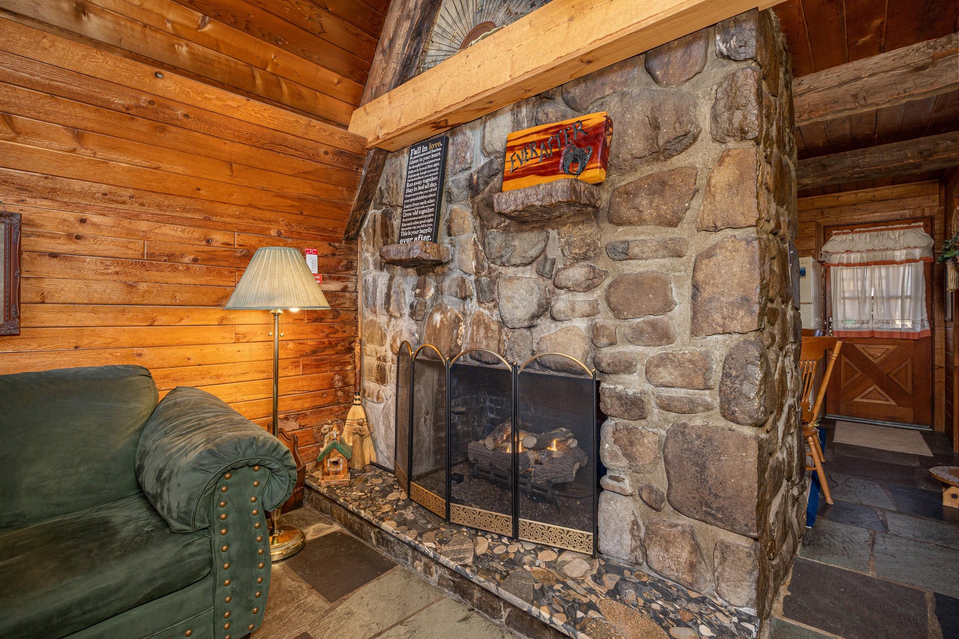 Stone fireplace at Ever After, a 1 bedroom cabin rental located in Gatlinburg