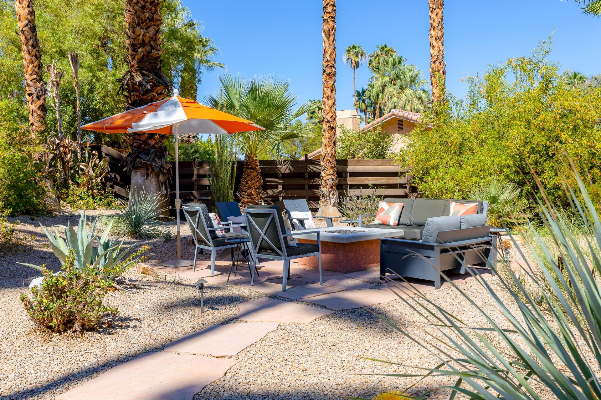 Enjoy the side yard with plenty of seat and a fire pit