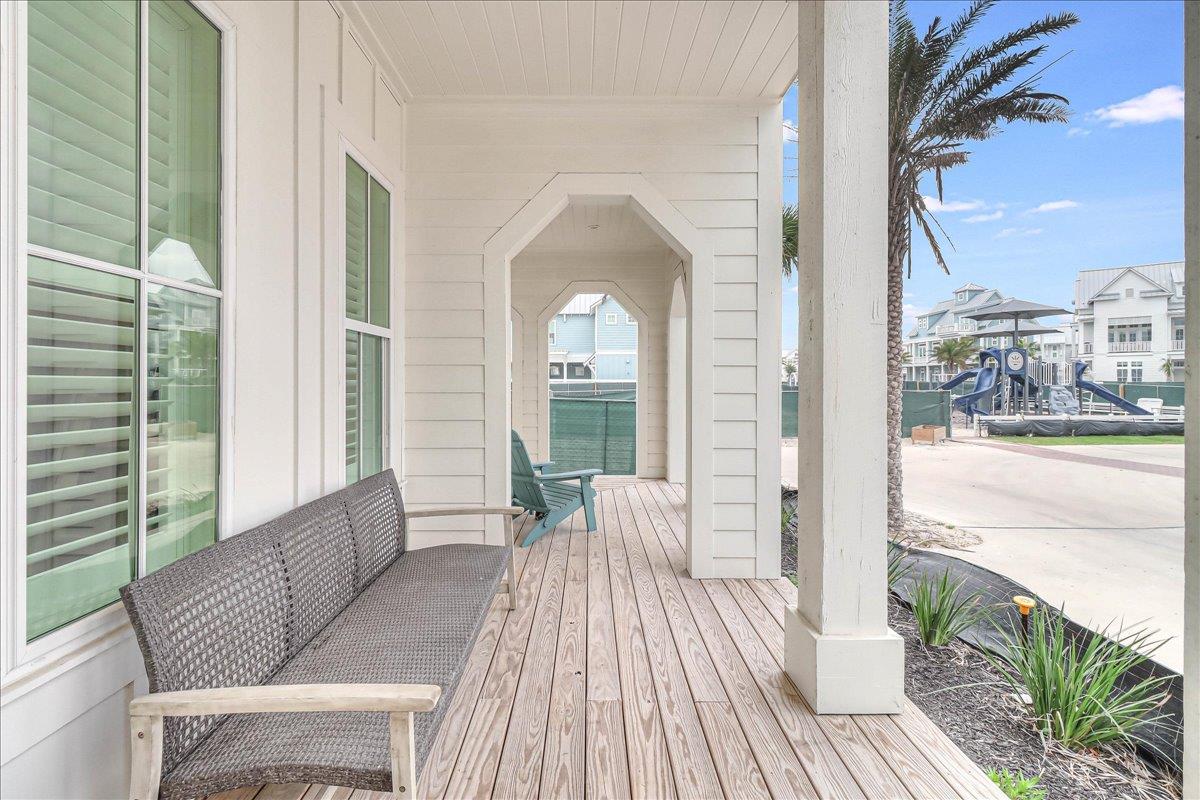 Wrap Around Porch Facing Neighborly Pool and Park