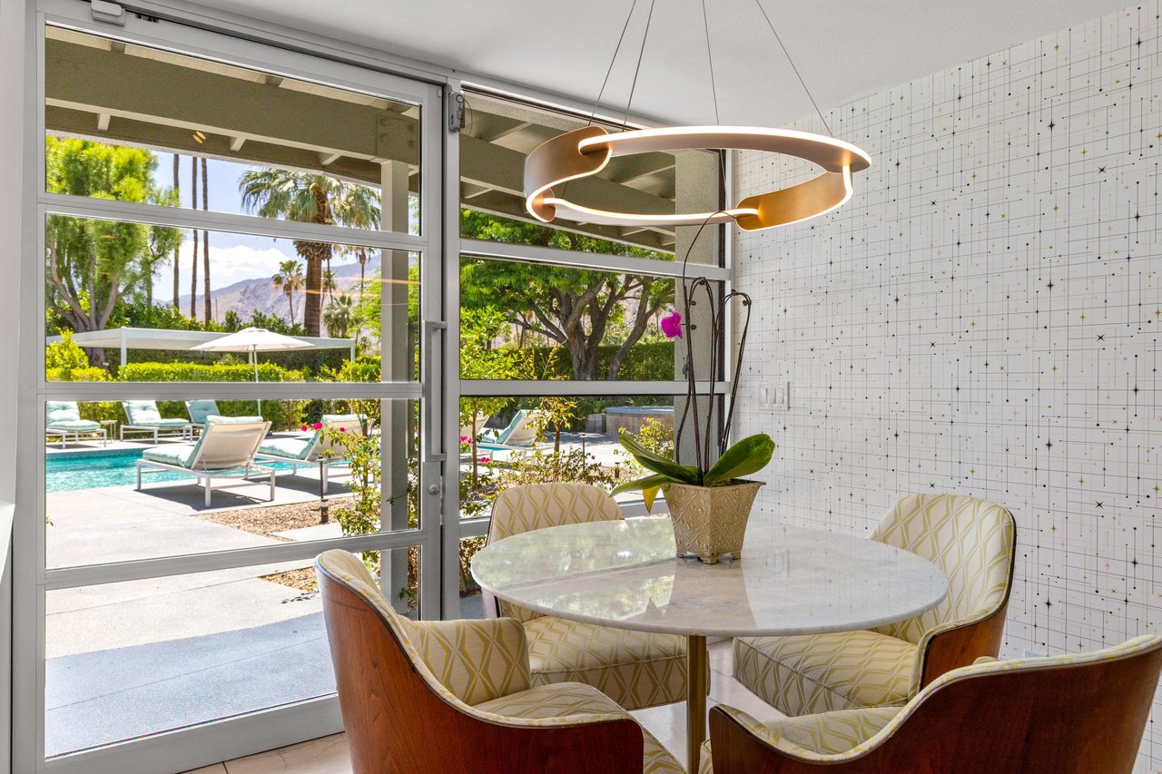 Perfect spot for a morning cup of coffee Direct access to the back patio and poolspa.