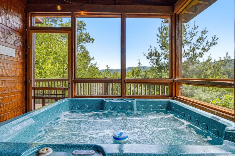 Imagine soaking in your private hot tub while gazing at lush forest views through floortoceiling windows—pure relaxation awaits you here.