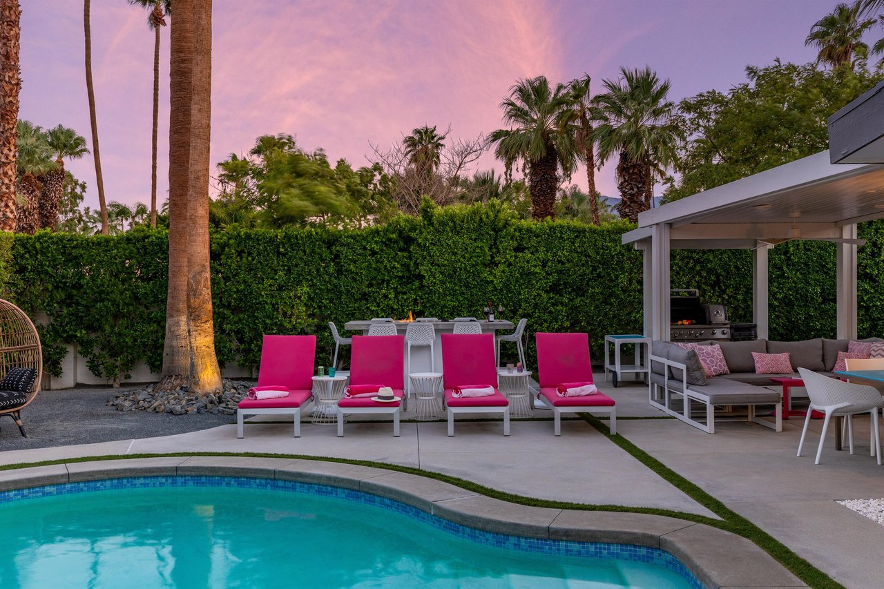 Four Pink Inviting Pool Loungers