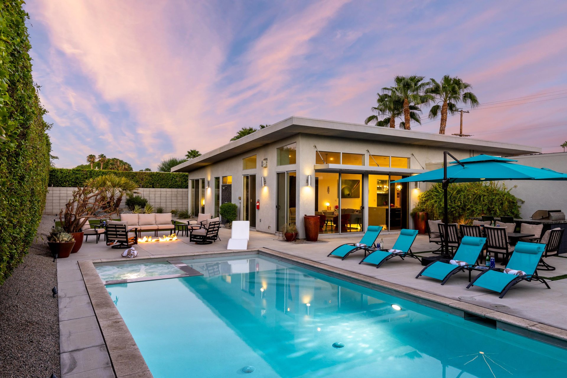 A stunning 3 bedroom, 2.5 bathroom home with a private pool, spa, outdoor shower, BBQ, and firepit located in Palm Springs, CA.