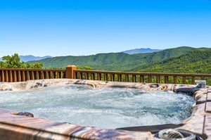 Soak in your private hot tub while gazing at stunning mountain vistas. The perfect spot to unwind and reconnect with natures beauty.