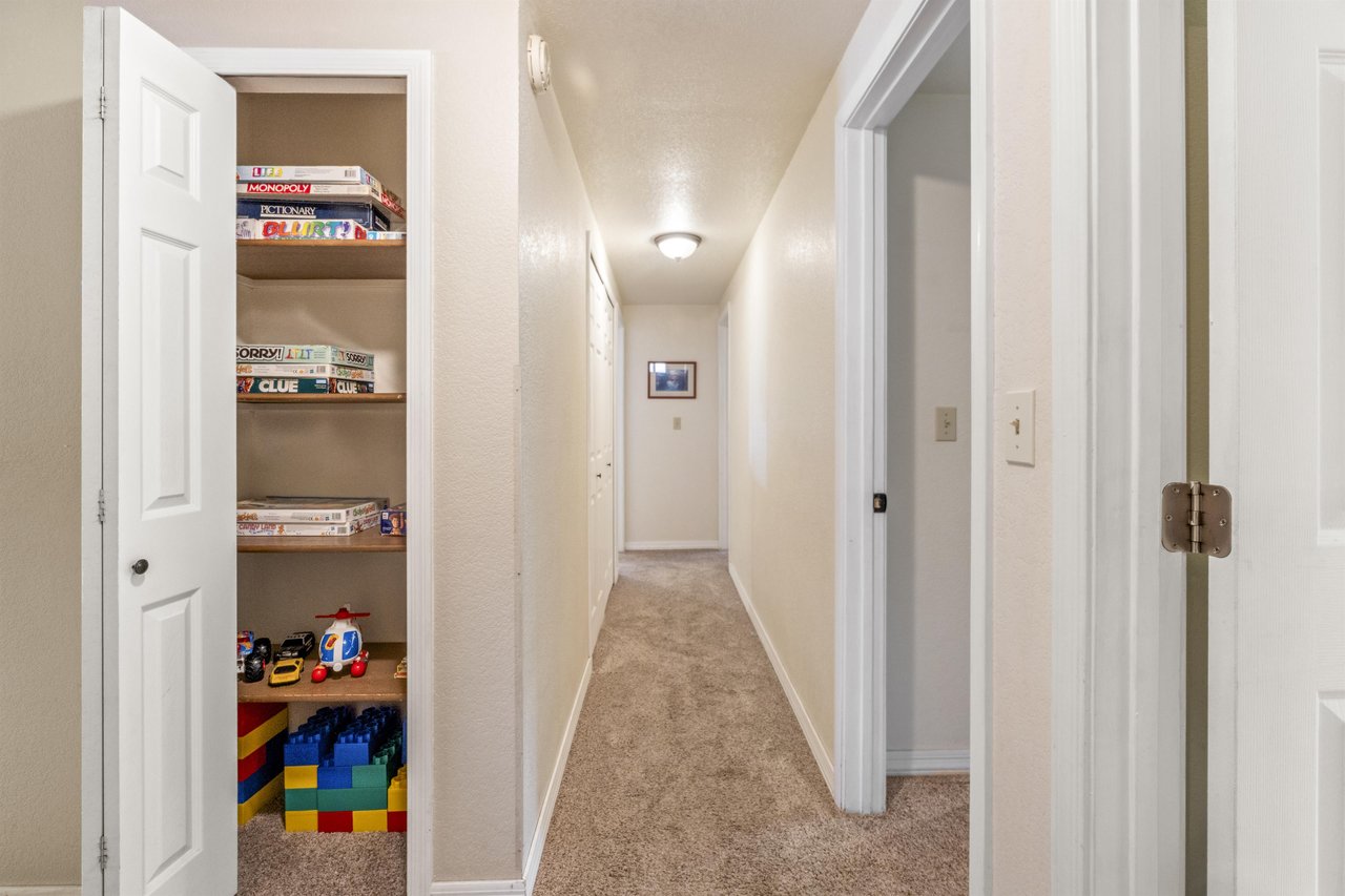 Hallway with storage and games