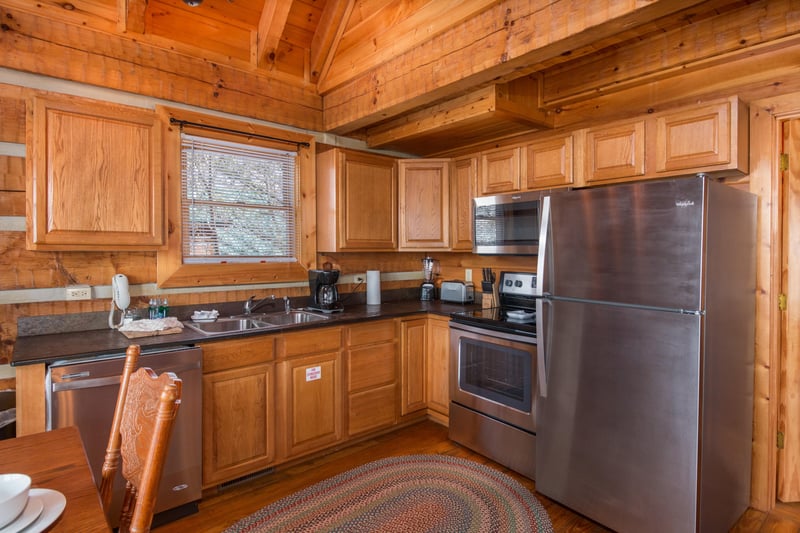 Kitchen with stainless appliances at EllaVation, a 3 bedroom cabin rental located in Gatlinburg