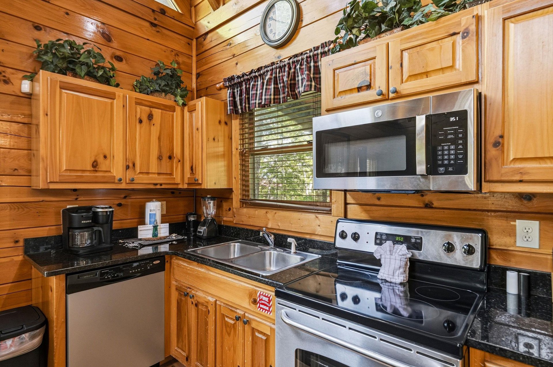 Your fully equipped kitchen features everything you need to prepare meals, including stainless steel appliances, a sleek microwave, and a coffee maker ready for your morning brew.