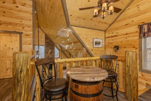 High top table in the loft at Everlys Splash, a 4 bedroom cabin rental located in Pigeon Forge