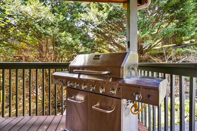 Fire up the grill and savor the fresh mountain air from your private deck surrounded by tall pines and natural greenery.