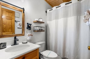 single vanity sink, tub and shower