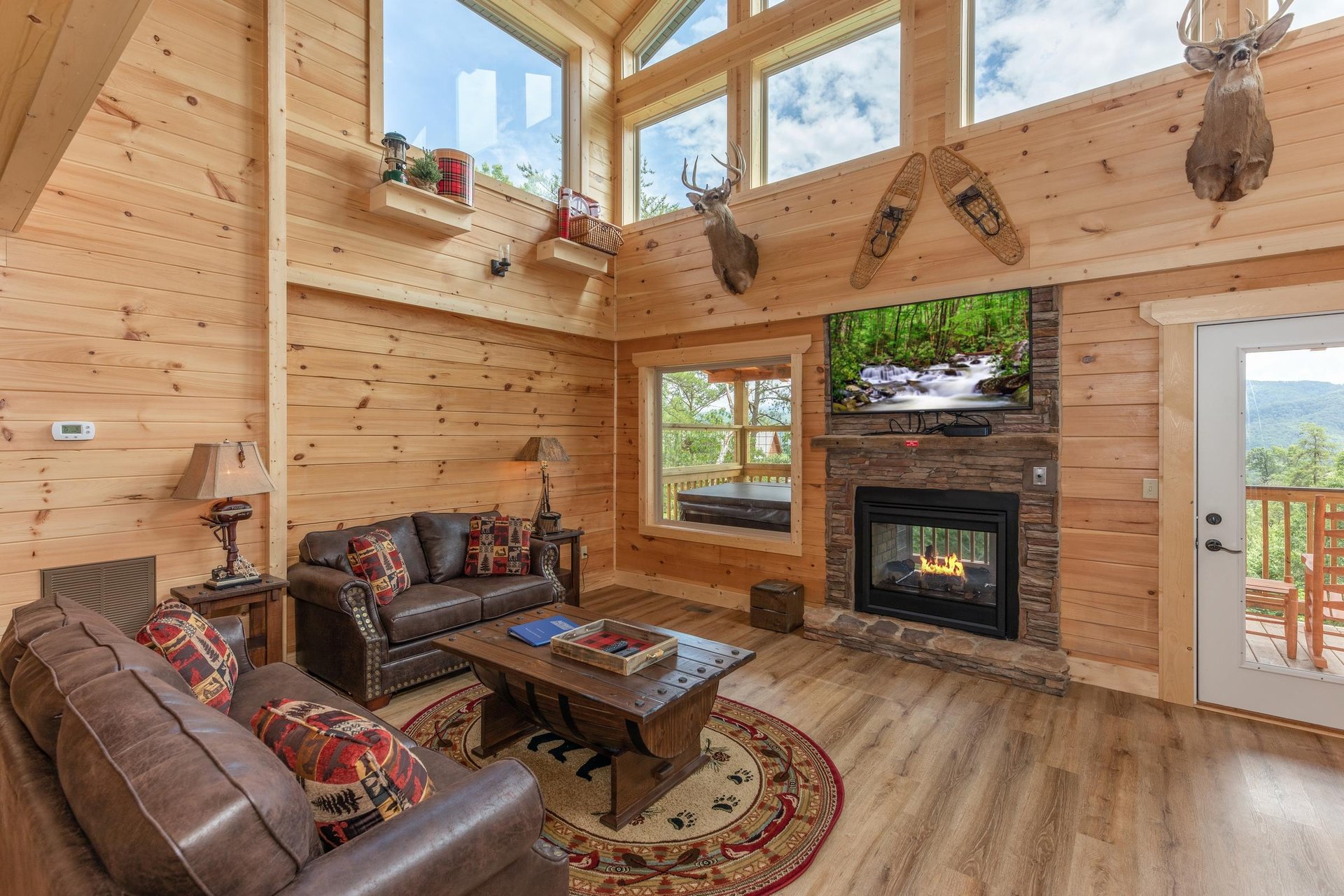 Living room with stone fireplace