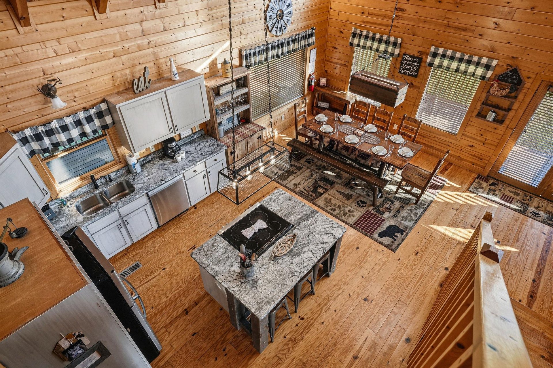 Gather around the rustic dining table or whip up a homecooked meal in your fully equipped kitchen, all within this cozy, sunlit cabin with charming wood details and mountain lodge ambiance.