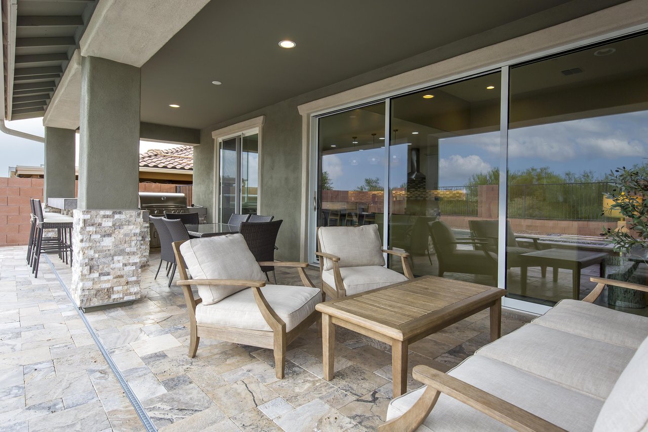 Outdoor seating overlooking the pool area.