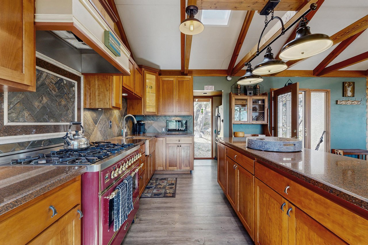 Modern appliances, including a custom stove.