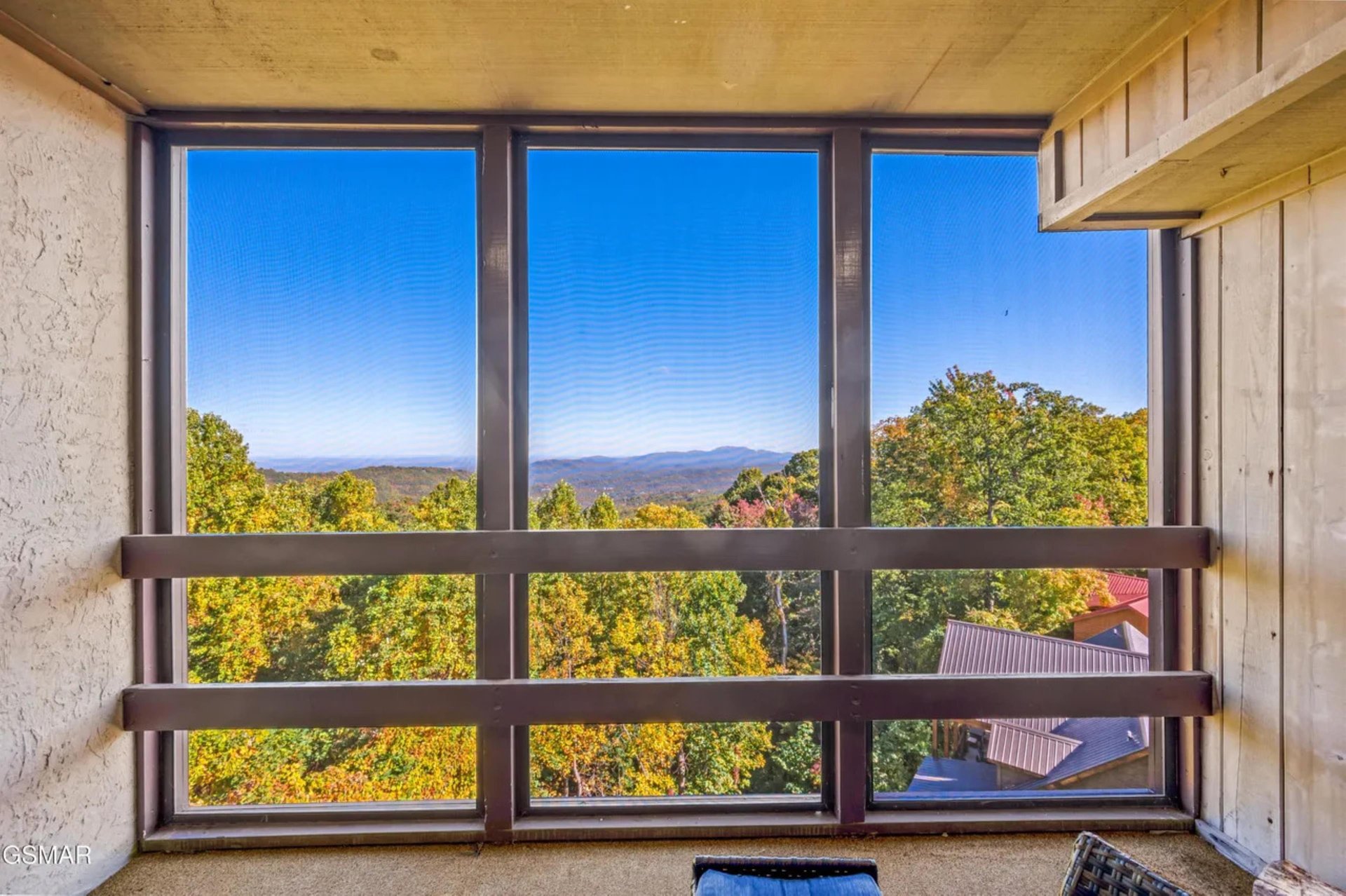 Soak in breathtaking mountain vistas from your private window seat, where autumn foliage frames distant peaks in natures perfect panorama.