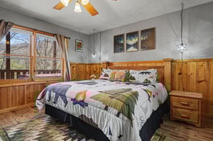 Drift off in your cozy retreat with rustic wood accents and naturethemed bedding, while forest views frame your peaceful mornings.